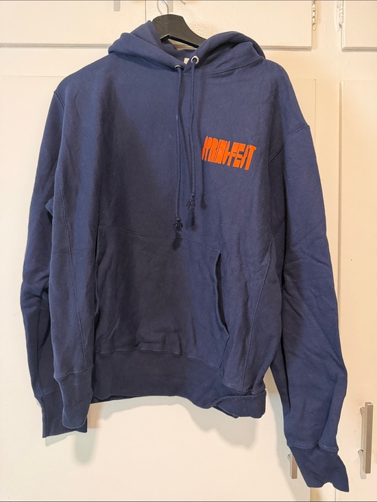Champion Sweaters - Champion Navy Hoodie with Orange Logo Print